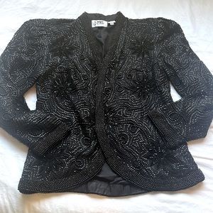 Beautiful beaded black jacket. 100% pure silk. Perfect condition.
